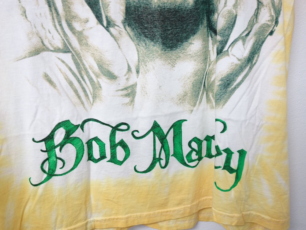  ե Bob Marley  T 