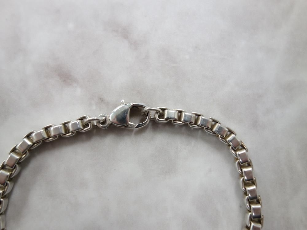 <img class='new_mark_img1' src='https://img.shop-pro.jp/img/new/icons15.gif' style='border:none;display:inline;margin:0px;padding:0px;width:auto;' />Tiffany & Co  ƥեˡ ٥ͥ ID ֥쥹å silver925  USED