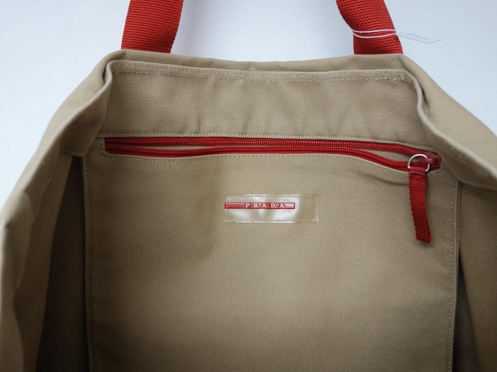 <img class='new_mark_img1' src='https://img.shop-pro.jp/img/new/icons15.gif' style='border:none;display:inline;margin:0px;padding:0px;width:auto;' />PRADA SPORT ץ  ХȡȥХå  ꥢ USED
