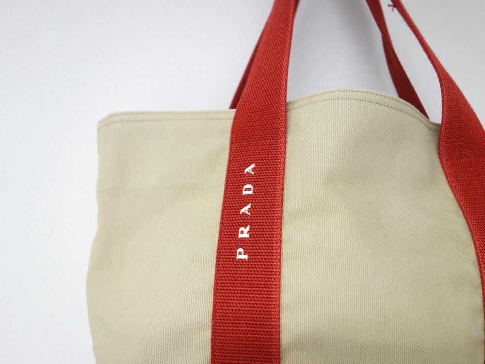 <img class='new_mark_img1' src='https://img.shop-pro.jp/img/new/icons15.gif' style='border:none;display:inline;margin:0px;padding:0px;width:auto;' />PRADA SPORT ץ  ХȡȥХå  ꥢ USED