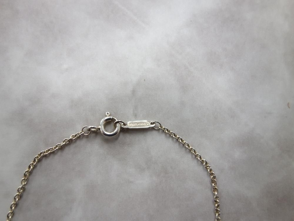 <img class='new_mark_img1' src='https://img.shop-pro.jp/img/new/icons15.gif' style='border:none;display:inline;margin:0px;padding:0px;width:auto;' />Tiffany & Co  ƥեˡ ȥ饹 ֥쥹å silver925 USED