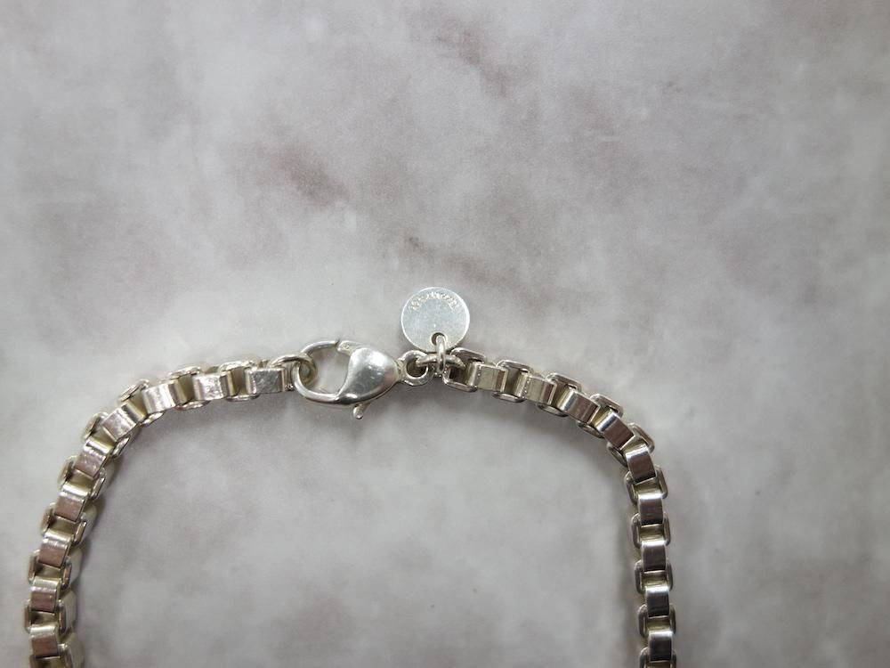 <img class='new_mark_img1' src='https://img.shop-pro.jp/img/new/icons15.gif' style='border:none;display:inline;margin:0px;padding:0px;width:auto;' />Tiffany & Co  ƥեˡ ٥ͥ ֥쥹å silver925 USED #1