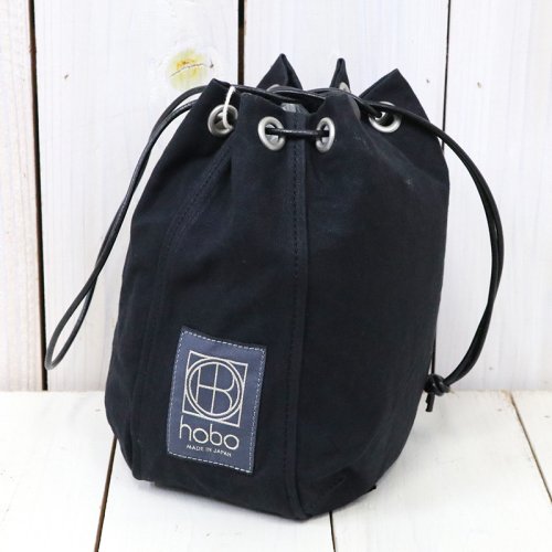 hobo『Drawstring Pouch Paraffin Canvas』