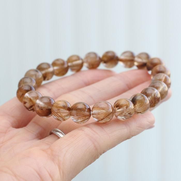 タイガールチルクォーツブレスレット ルチルクォーツ・レッドタイガーアイ・オニキス ブレスレット