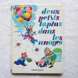 deux petits lapins dans les nuages