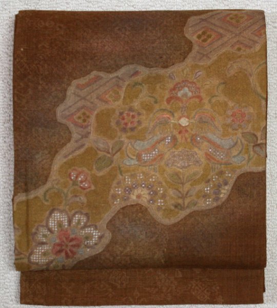 未使用の唐茶色紬・仙頭刺繍しゃれ袋帯 - リサイクル着物のことなら京都で創業80年の老舗ゑちごやへ