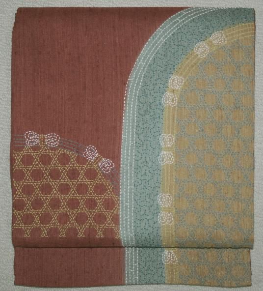未使用の紅鳶色刺し子刺繍生紬袋帯（お勧め品です