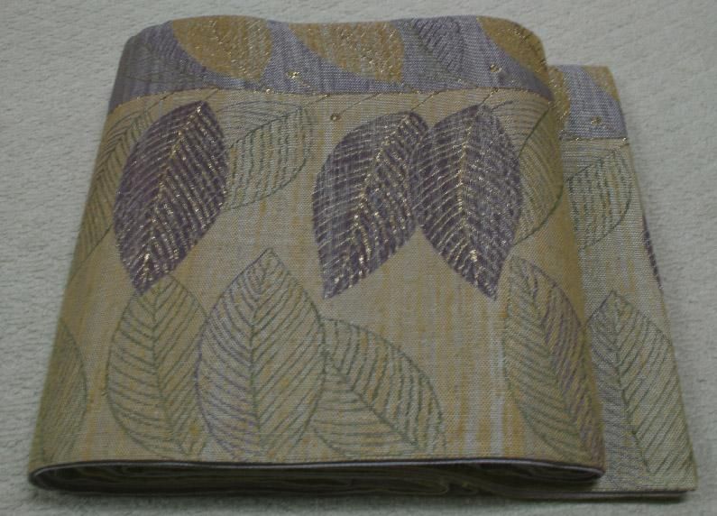 未使用のカーキー色葉っぱ模様しゃれ袋帯（お勧め品です