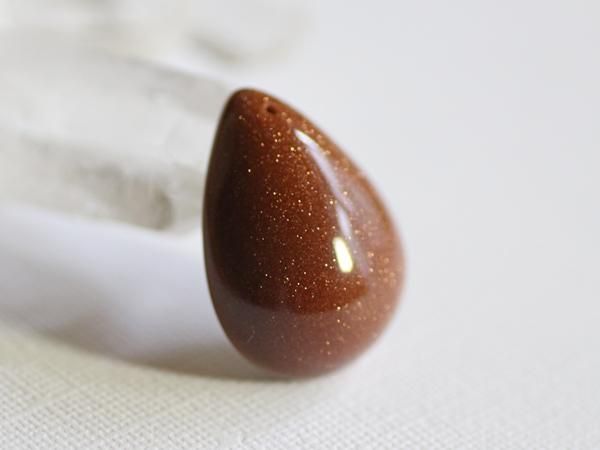 茶金石（ゴールドストーン）／ベビーヒップ穴あきルース（大） - 貴石