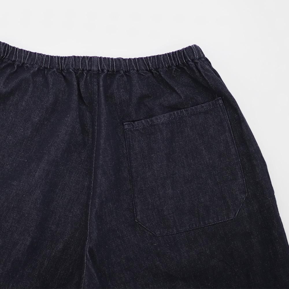 COMOLI (コモリ) ネイビーデニム テーパードパンツ