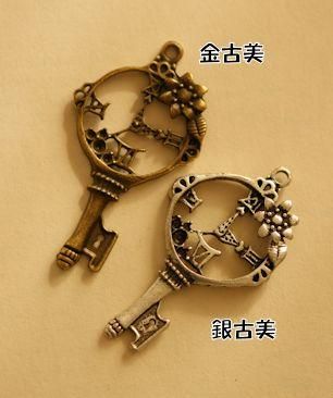 アンティーク 銀メッキ製 ほそ メタル製 紋章のウォッチフォブ