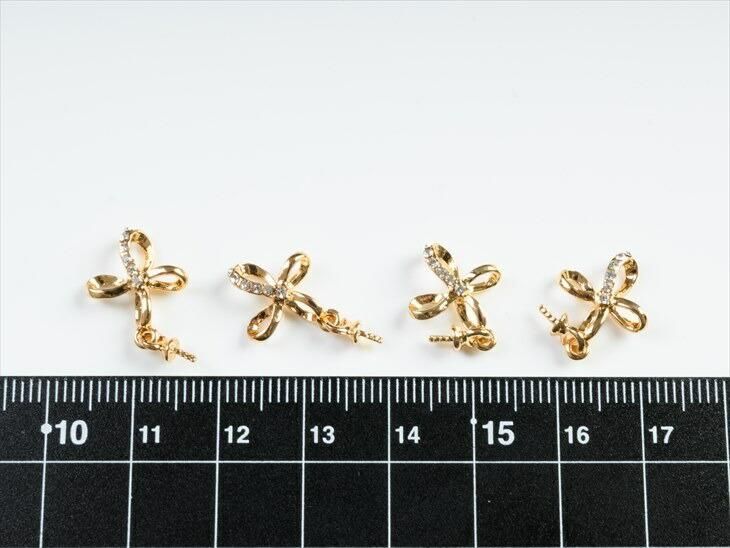 デザインヒートン ニッケルフリー 変退色防止加工済 揺れる クロスリボン アクセサリー パーツ ゴールド 20mm 4個 アレルギー対応 2cm 問屋 - ハンドメイド アクセサリー パーツ レジン用品のネット通販 紗や工房 デザインヒートン ニッケルフリー 変退色防止加工済 揺れる クロスリボン アクセサリー パーツ ゴールド 20mm 4個 アレルギー対応 2cm 問屋 - ハンドメイド アクセサリー パーツ レジン用品のネット通販 紗や工房