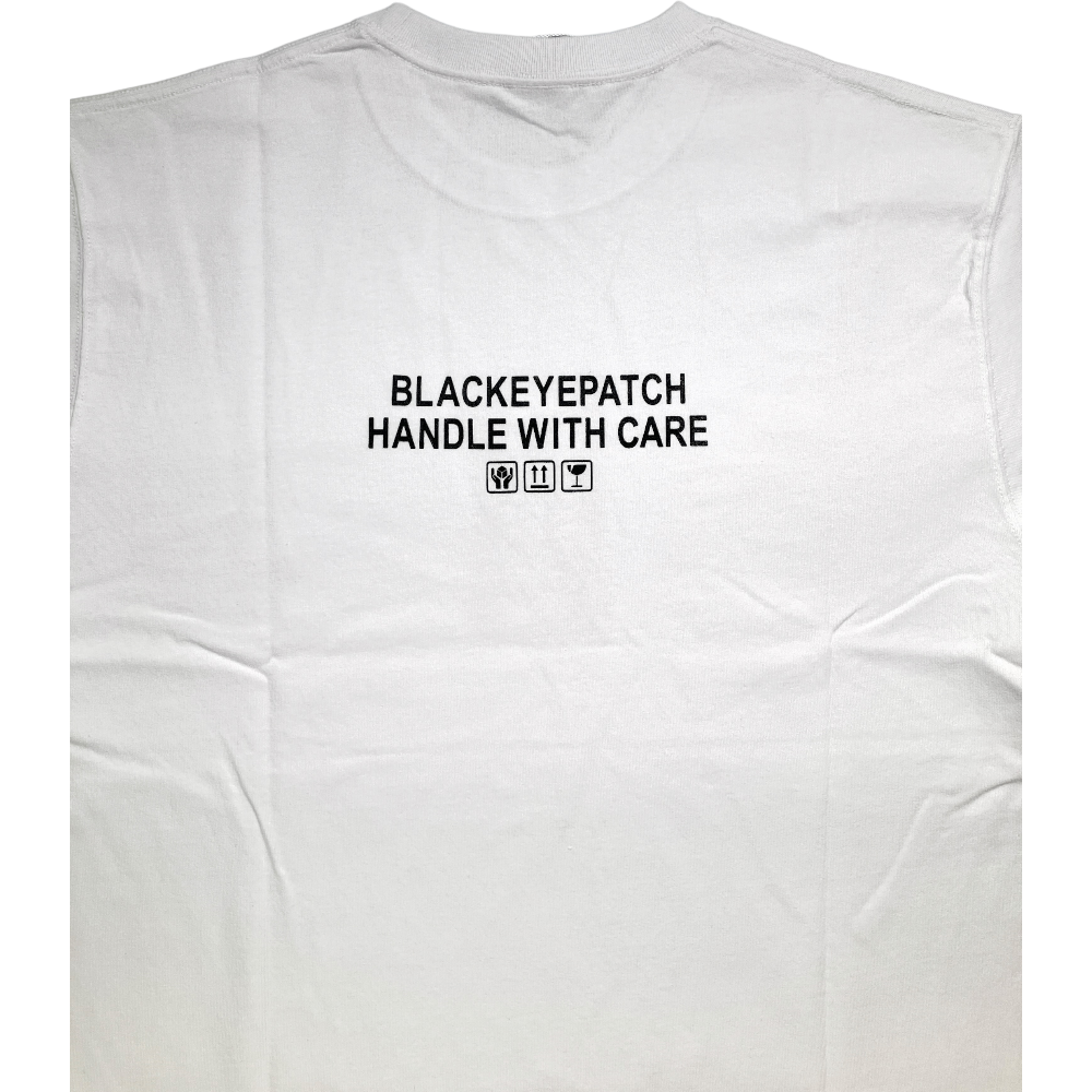 BLACK EYE PATCH HANDLE WITH CARE TEE