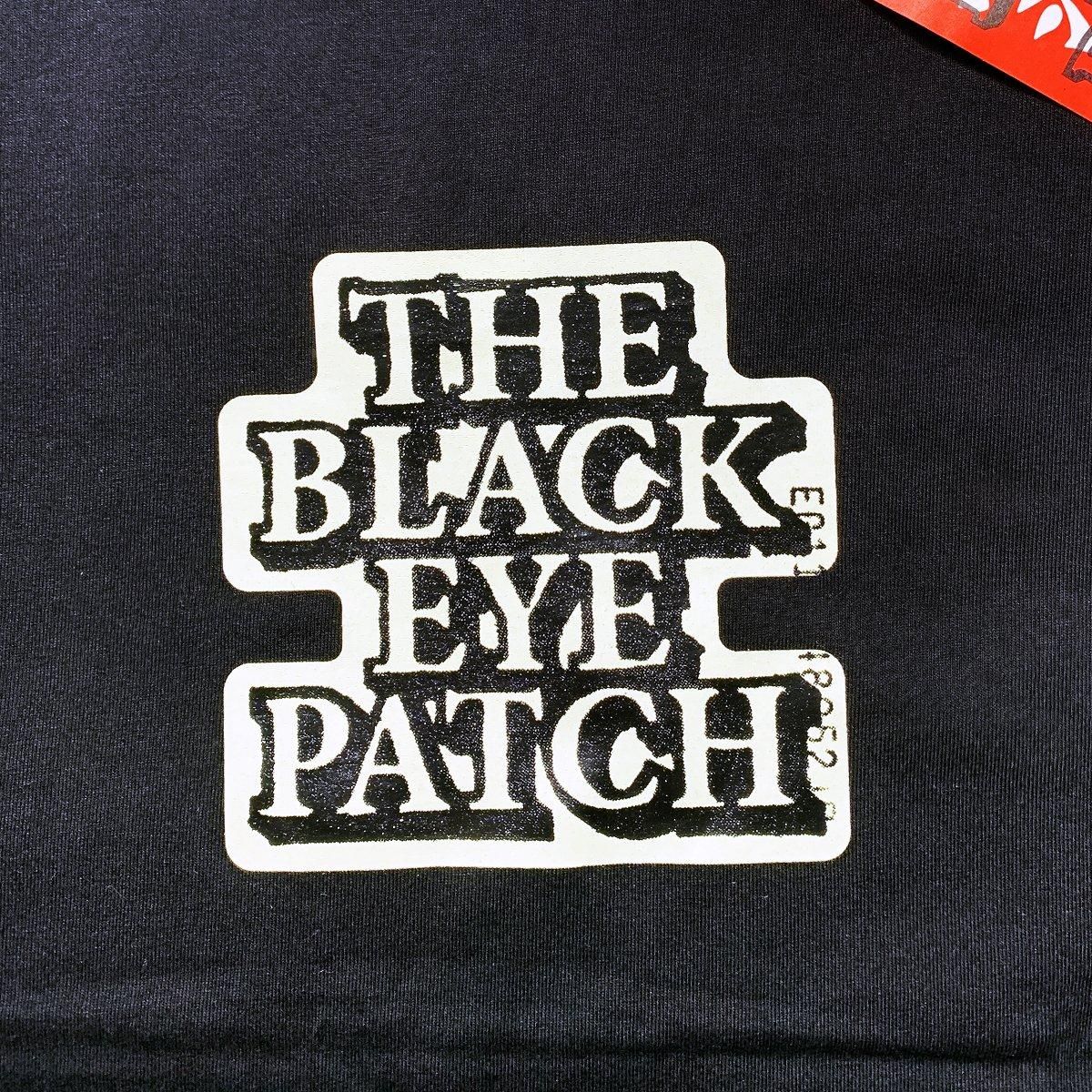 黒 black eye patch OG LABEL BABY TEE - メルカリ