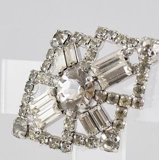 クリスチャンディオール  ダイヤ 0.25ct ブローチ