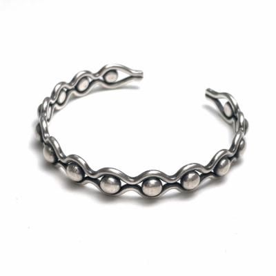 Karen silver bangle "Ball and wavy lines"