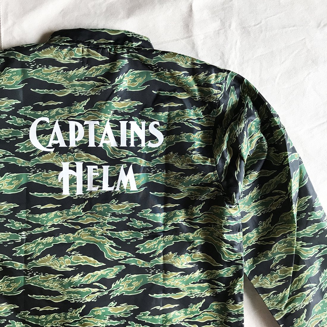 CAPTAINS HELM #TIGER CAMO LOGO COACH JKT - CAPTAINS HELM WEB STORE