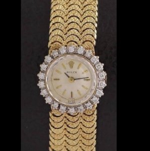 ロレックス　レディースアンティーク腕時計　ゴールドのブレスに、花が咲いたように見えるケース