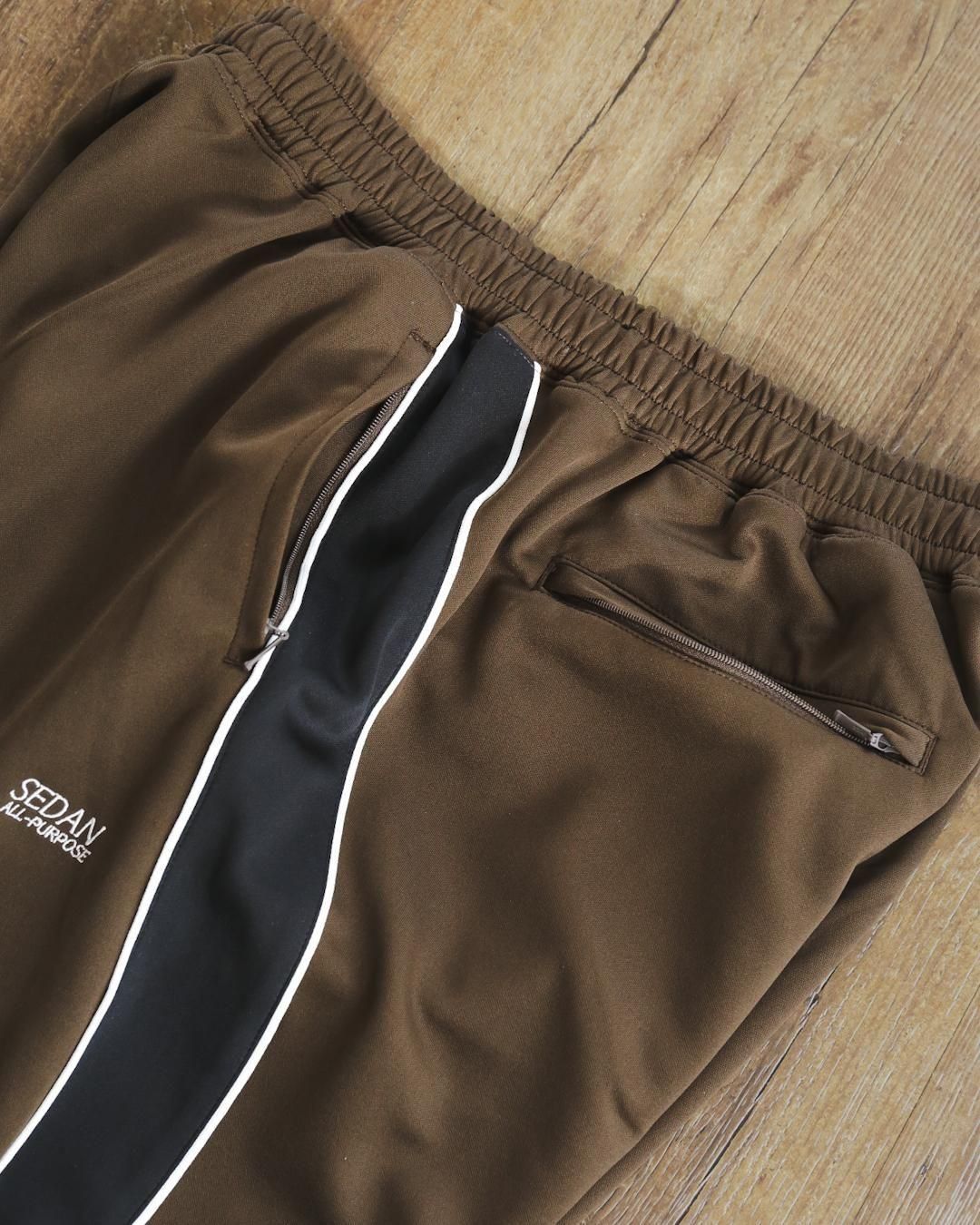 SEDAN ALL-PURPOSE [セダンオールパーパス] | OG LOGO TRACK PANTS