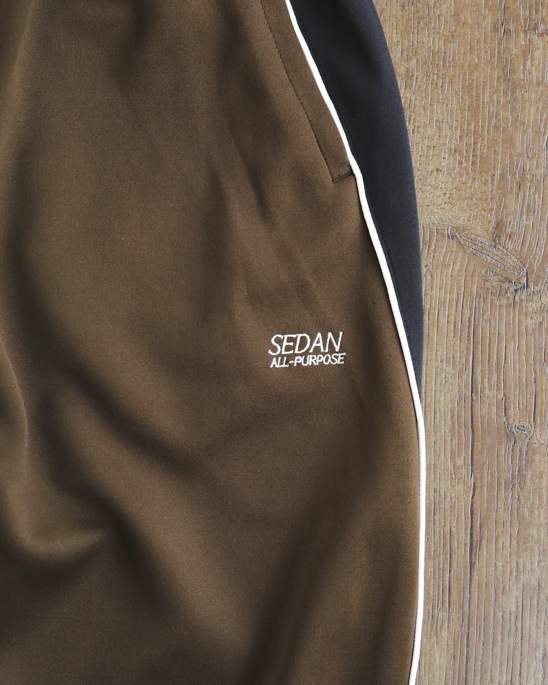 SEDAN ALL-PURPOSE [セダンオールパーパス] | OG LOGO TRACK PANTS