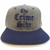 <img class='new_mark_img1' src='https://img.shop-pro.jp/img/new/icons30.gif' style='border:none;display:inline;margin:0px;padding:0px;width:auto;' />Rocksmith x Wu- Tang LTD "The Crime Side" スナップバック / グレー×ネイビー