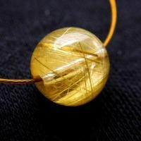 <img class='new_mark_img1' src='https://img.shop-pro.jp/img/new/icons5.gif' style='border:none;display:inline;margin:0px;padding:0px;width:auto;' />タイチンゴールドルチル 9.5mm丸珠 1粒売り