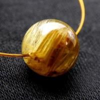 <img class='new_mark_img1' src='https://img.shop-pro.jp/img/new/icons5.gif' style='border:none;display:inline;margin:0px;padding:0px;width:auto;' />タイチンゴールドルチル 9.5mm丸珠 1粒売り