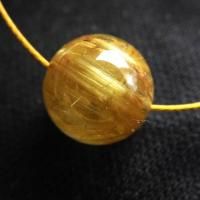 <img class='new_mark_img1' src='https://img.shop-pro.jp/img/new/icons5.gif' style='border:none;display:inline;margin:0px;padding:0px;width:auto;' />タイチンゴールドルチル 9.5mm丸珠 1粒売り