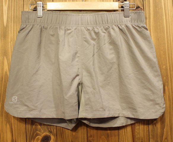 beige running shorts