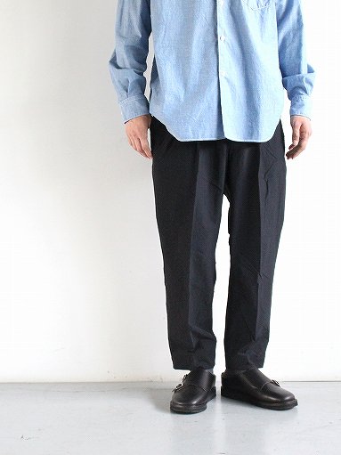 and wander (アンドワンダー) Plain Tapered Stretch Pants