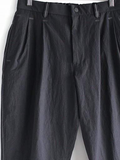 and wander (アンドワンダー) Plain Tapered Stretch Pants