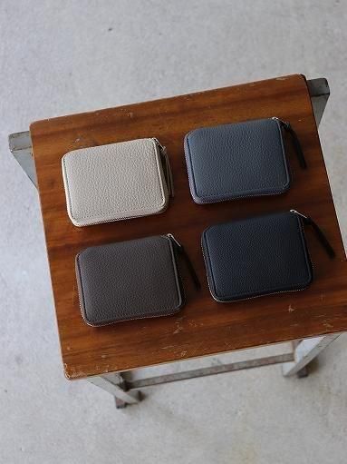 ERA. EO SHRINK ROUND PALM WALLET