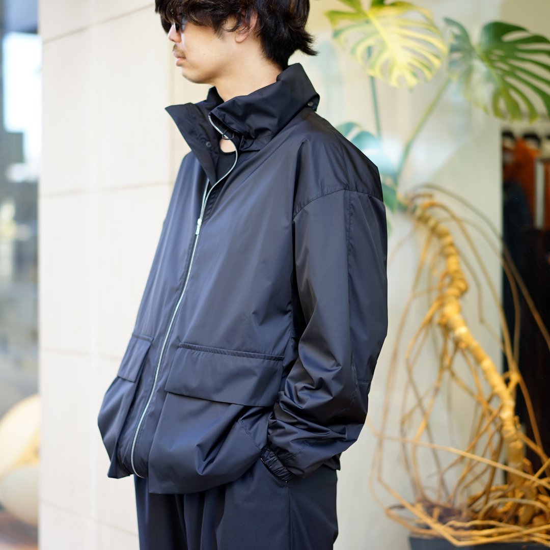 AURALEE(オーラリー)Hard Twist Polyester Satin Laminate Zip Blouson ...