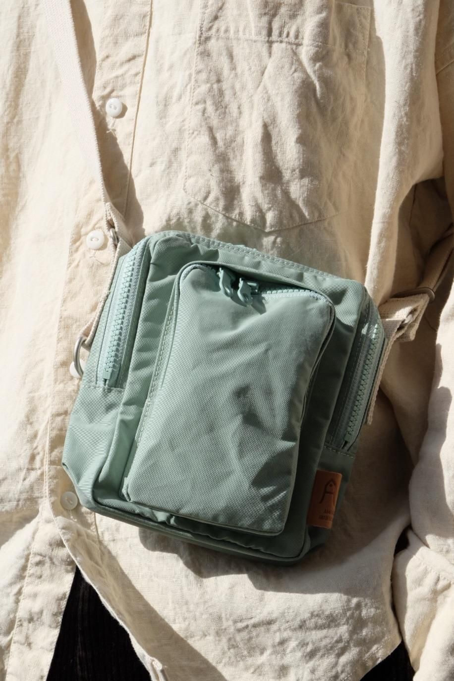 AMIACALVA ߥ-N/C CLOTH WP POCHETTE-MINT