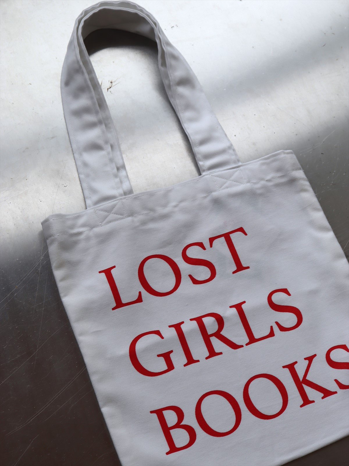 NINE STORIES　LOST GIRLS BOOKS tote bag small white