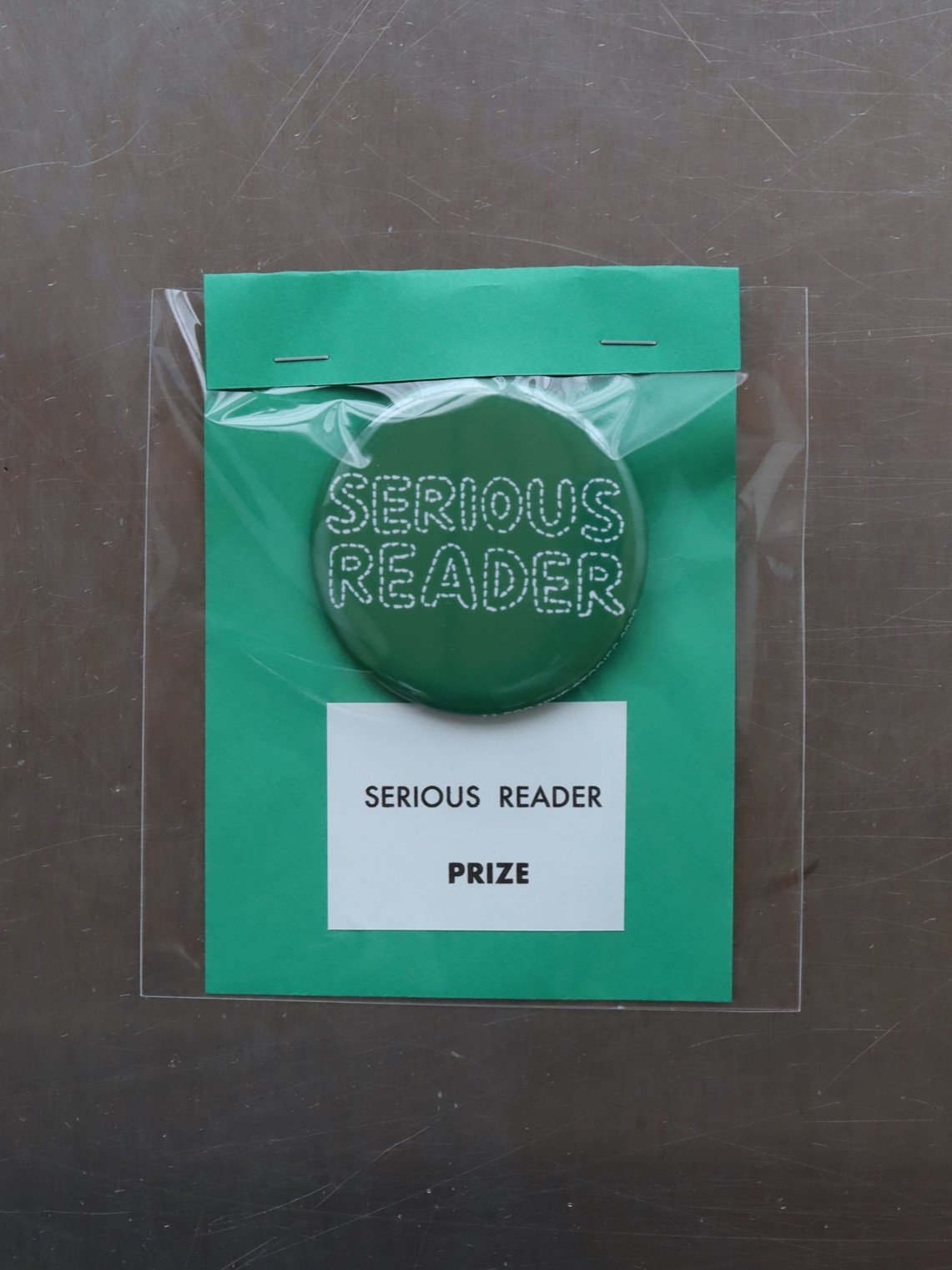 NINE STORIES　SERIOUS  READER  PRIZE　バッジ　green
